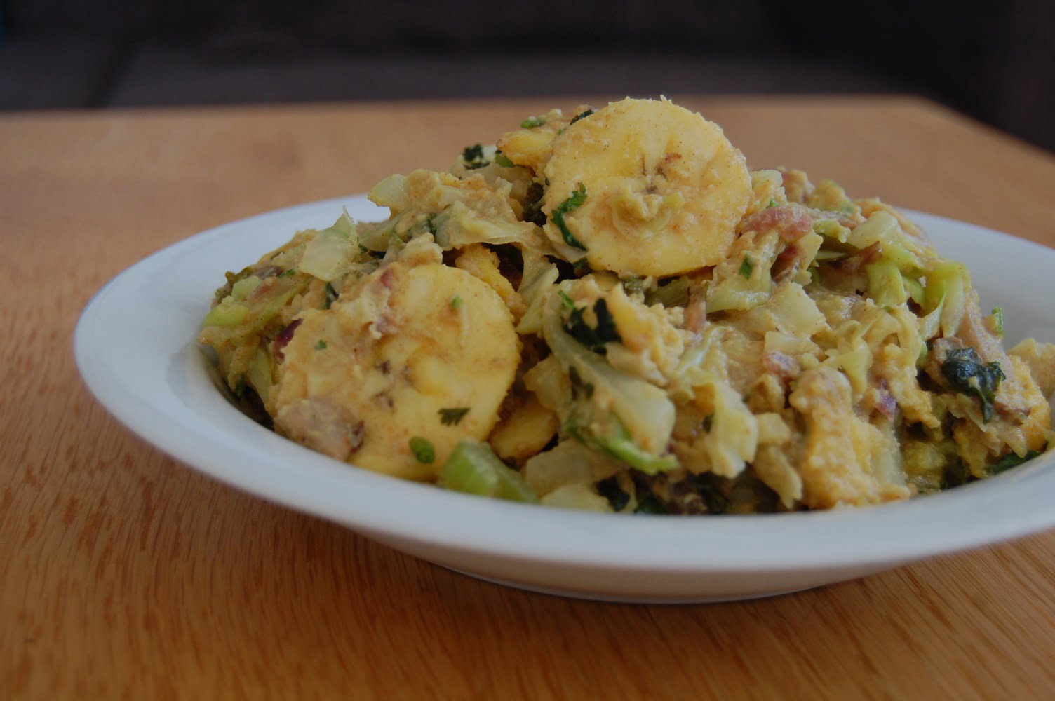 Spitskoolcurry met bakbanaan