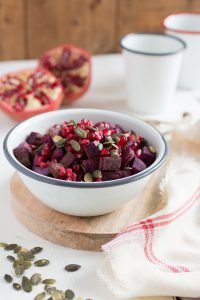 Zoete aardappelsalade met granaatappel