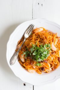 Zoete aardappelpasta met pancetta en mandarijn